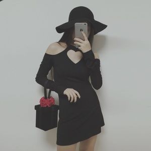 A cool heart cut little black dress
